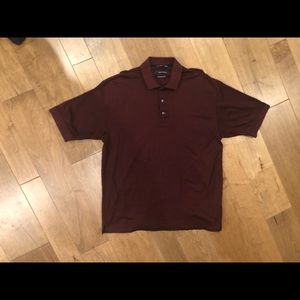 Greg Norman men’s short sleeve polo.  Burgundy